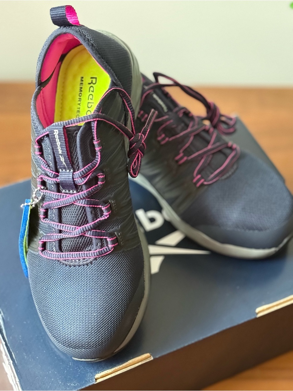 Reebok Women's Black Athletic Sneakers with Pink Accents